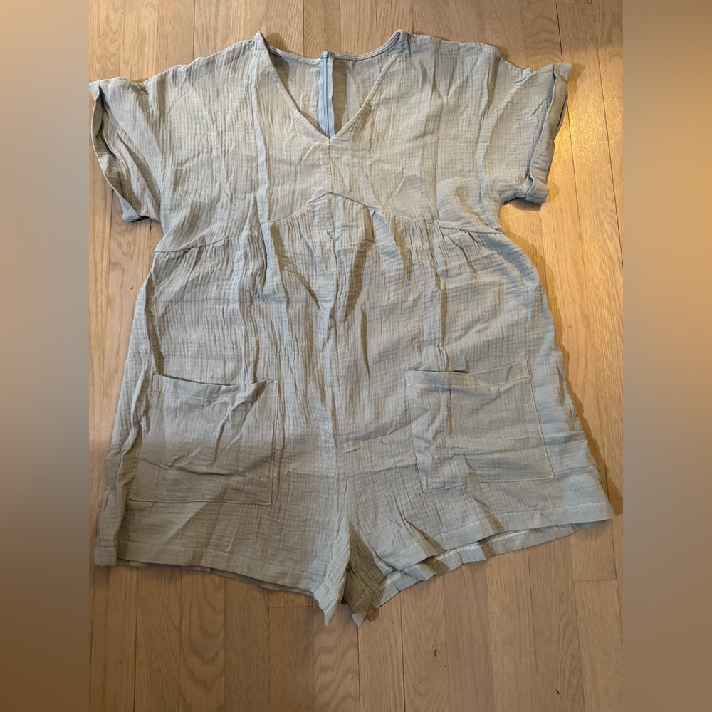 Brand new. Never worn. Gauze romper XL. Zipper back. Pretty sage green